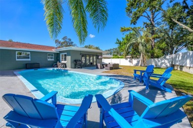 Welcome to this beautifully remodeled 3 bedroom, 2 bathroom pool on Mangrove Bay Golf Course in Florida - for sale on GolfHomes.com, golf home, golf lot