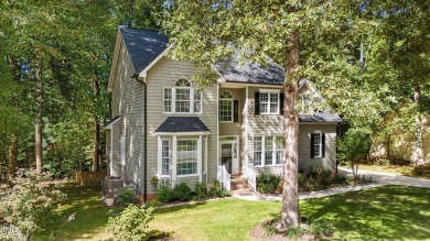 Welcome to this beautiful two-story home on a private, wooded on The Neuse Golf Club in North Carolina - for sale on GolfHomes.com, golf home, golf lot