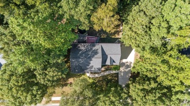 Welcome to this beautiful two-story home on a private, wooded on The Neuse Golf Club in North Carolina - for sale on GolfHomes.com, golf home, golf lot