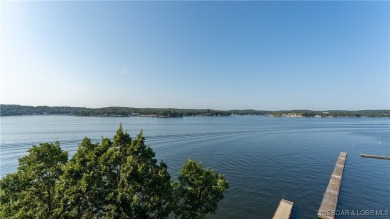 Boasting expansive main channel views and the superb amenities on Seasons Ridge At Four Seasons in Missouri - for sale on GolfHomes.com, golf home, golf lot
