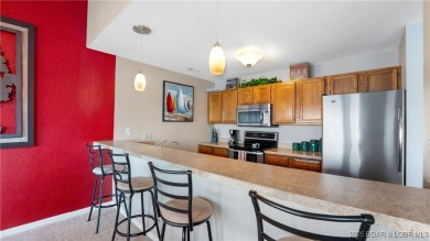 Boasting expansive main channel views and the superb amenities on Seasons Ridge At Four Seasons in Missouri - for sale on GolfHomes.com, golf home, golf lot