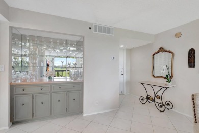 BRIDGEWOOD  2 BED 2 BATH CORNER UNIT. THE VILLAGE OF BRIDGEWOOD on Boca West Golf and Country Club in Florida - for sale on GolfHomes.com, golf home, golf lot