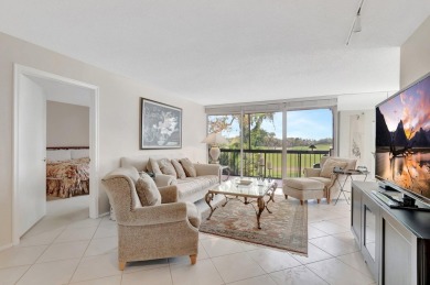 BRIDGEWOOD  2 BED 2 BATH CORNER UNIT. THE VILLAGE OF BRIDGEWOOD on Boca West Golf and Country Club in Florida - for sale on GolfHomes.com, golf home, golf lot