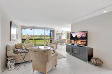 BRIDGEWOOD  2 BED 2 BATH CORNER UNIT. THE VILLAGE OF BRIDGEWOOD on Boca West Golf and Country Club in Florida - for sale on GolfHomes.com, golf home, golf lot