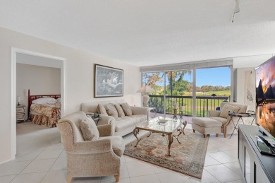 BRIDGEWOOD  2 BED 2 BATH CORNER UNIT. THE VILLAGE OF BRIDGEWOOD on Boca West Golf and Country Club in Florida - for sale on GolfHomes.com, golf home, golf lot