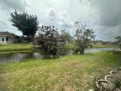 Renovated Waterfront Villa! Freshly painted, vinyl wood flooring on Kings Point Golf -Flanders Way in Florida - for sale on GolfHomes.com, golf home, golf lot
