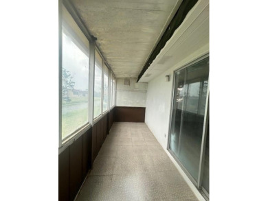 Renovated Waterfront Villa! Freshly painted, vinyl wood flooring on Kings Point Golf -Flanders Way in Florida - for sale on GolfHomes.com, golf home, golf lot