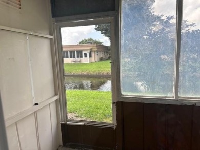 Renovated Waterfront Villa! Freshly painted, vinyl wood flooring on Kings Point Golf -Flanders Way in Florida - for sale on GolfHomes.com, golf home, golf lot