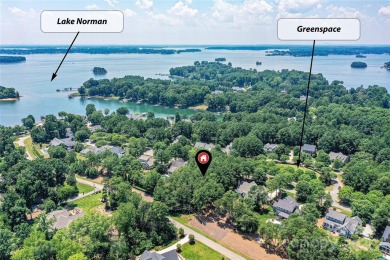 Beautiful, Waterview, level, wooded lot located in the gated on Trump National Golf Club Charlotte in North Carolina - for sale on GolfHomes.com, golf home, golf lot