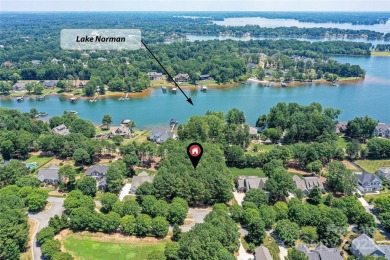Beautiful, Waterview, level, wooded lot located in the gated on Trump National Golf Club Charlotte in North Carolina - for sale on GolfHomes.com, golf home, golf lot