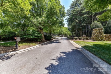 Beautiful, Waterview, level, wooded lot located in the gated on Trump National Golf Club Charlotte in North Carolina - for sale on GolfHomes.com, golf home, golf lot