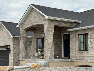 Spiral piers are the focal point of the double door grand entry on Teton Lakes Golf Courses in Idaho - for sale on GolfHomes.com, golf home, golf lot