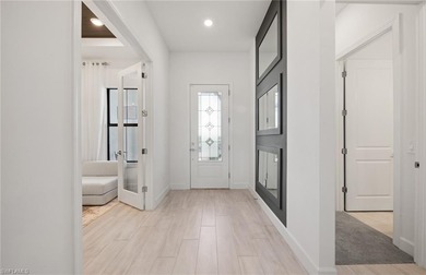 Step inside the stunning Stellar home in Terreno by DiVosta on Valencia Golf and Country Club in Florida - for sale on GolfHomes.com, golf home, golf lot