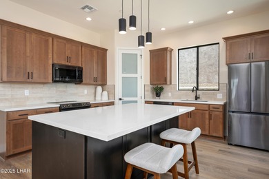 This brand-new townhome in Residential Estates bordering the on London Bridge Golf Course in Arizona - for sale on GolfHomes.com, golf home, golf lot
