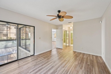 Amazing UPDATED MOVE-IN READY GROUND FLOOR END UNIT CONDO in PGA on PGA National Golf Club in Florida - for sale on GolfHomes.com, golf home, golf lot