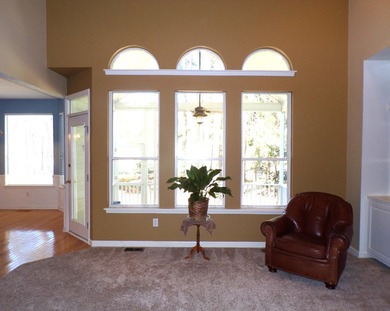 Nestled on the second tee of a premier golf course, this on Legend Oaks Plantation Golf Club in South Carolina - for sale on GolfHomes.com, golf home, golf lot