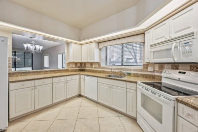 Amazing UPDATED MOVE-IN READY GROUND FLOOR END UNIT CONDO in PGA on PGA National Golf Club in Florida - for sale on GolfHomes.com, golf home, golf lot