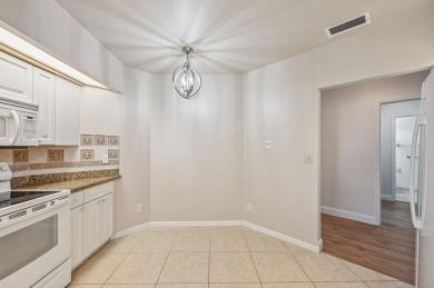 Amazing UPDATED MOVE-IN READY GROUND FLOOR END UNIT CONDO in PGA on PGA National Golf Club in Florida - for sale on GolfHomes.com, golf home, golf lot