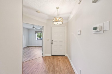 Amazing UPDATED MOVE-IN READY GROUND FLOOR END UNIT CONDO in PGA on PGA National Golf Club in Florida - for sale on GolfHomes.com, golf home, golf lot