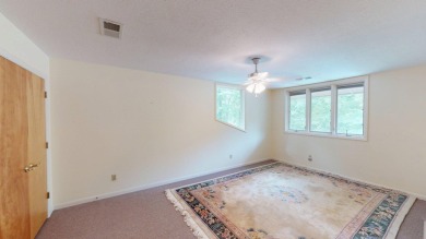 This Frank Lloyd Wright designed home has a large open floor on  in Tennessee - for sale on GolfHomes.com, golf home, golf lot