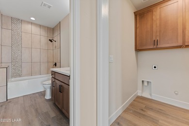 This brand-new townhome in Residential Estates bordering the on London Bridge Golf Course in Arizona - for sale on GolfHomes.com, golf home, golf lot