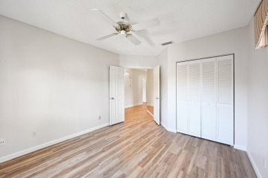 Amazing UPDATED MOVE-IN READY GROUND FLOOR END UNIT CONDO in PGA on PGA National Golf Club in Florida - for sale on GolfHomes.com, golf home, golf lot