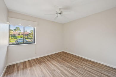 Amazing UPDATED MOVE-IN READY GROUND FLOOR END UNIT CONDO in PGA on PGA National Golf Club in Florida - for sale on GolfHomes.com, golf home, golf lot