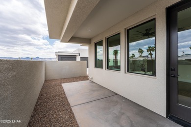 This brand-new townhome in Residential Estates bordering the on London Bridge Golf Course in Arizona - for sale on GolfHomes.com, golf home, golf lot