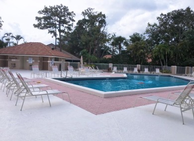 Amazing UPDATED MOVE-IN READY GROUND FLOOR END UNIT CONDO in PGA on PGA National Golf Club in Florida - for sale on GolfHomes.com, golf home, golf lot