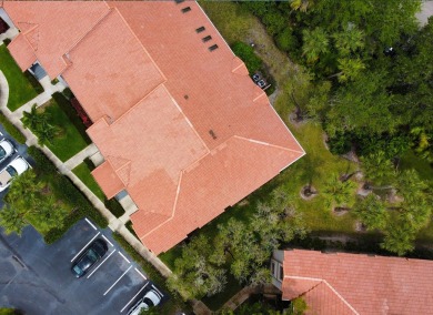 Amazing UPDATED MOVE-IN READY GROUND FLOOR END UNIT CONDO in PGA on PGA National Golf Club in Florida - for sale on GolfHomes.com, golf home, golf lot