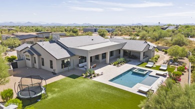 Built in 2021 on 1.73 acres, this contemporary retreat is on Desert Highlands Golf Club in Arizona - for sale on GolfHomes.com, golf home, golf lot