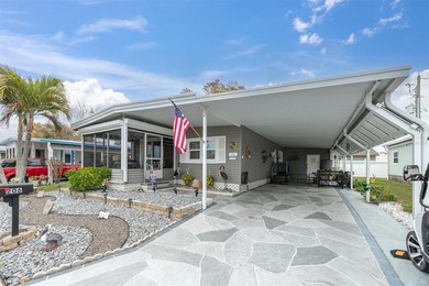 Come see this beautifully updated 2-bedroom, 2-bath manufactured on Largo Golf Course in Florida - for sale on GolfHomes.com, golf home, golf lot