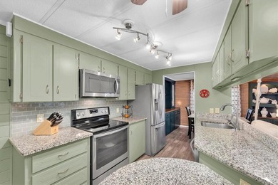 Come see this beautifully updated 2-bedroom, 2-bath manufactured on Largo Golf Course in Florida - for sale on GolfHomes.com, golf home, golf lot