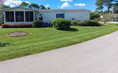 Beautiful Corner Lot partially furnished home with 2 bedrooms, 2 on Pine Lakes Country Club in Florida - for sale on GolfHomes.com, golf home, golf lot