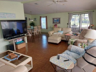 Beautiful Corner Lot partially furnished home with 2 bedrooms, 2 on Pine Lakes Country Club in Florida - for sale on GolfHomes.com, golf home, golf lot