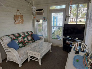 Beautiful Corner Lot partially furnished home with 2 bedrooms, 2 on Pine Lakes Country Club in Florida - for sale on GolfHomes.com, golf home, golf lot