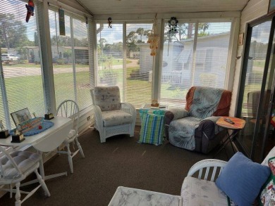 Beautiful Corner Lot partially furnished home with 2 bedrooms, 2 on Pine Lakes Country Club in Florida - for sale on GolfHomes.com, golf home, golf lot