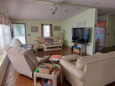 Beautiful Corner Lot partially furnished home with 2 bedrooms, 2 on Pine Lakes Country Club in Florida - for sale on GolfHomes.com, golf home, golf lot