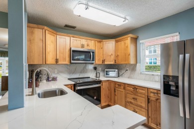 It's ALL about the VIEW! Well cared for & updated ground floor on The American Golf Club in Florida - for sale on GolfHomes.com, golf home, golf lot
