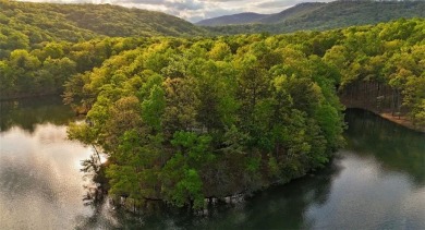 This is a light and bright, fully renovated, real log cabin in on Big Canoe Golf Club - Cherokee in Georgia - for sale on GolfHomes.com, golf home, golf lot