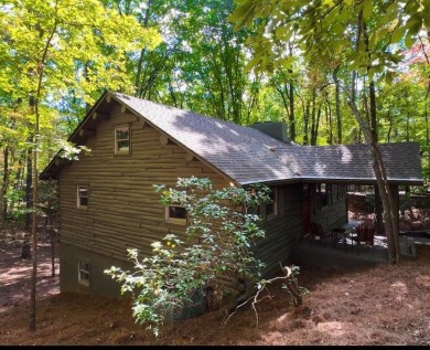 This is a light and bright, fully renovated, real log cabin in on Big Canoe Golf Club - Cherokee in Georgia - for sale on GolfHomes.com, golf home, golf lot