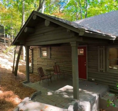 This is a light and bright, fully renovated, real log cabin in on Big Canoe Golf Club - Cherokee in Georgia - for sale on GolfHomes.com, golf home, golf lot