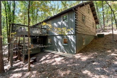 This is a light and bright, fully renovated, real log cabin in on Big Canoe Golf Club - Cherokee in Georgia - for sale on GolfHomes.com, golf home, golf lot