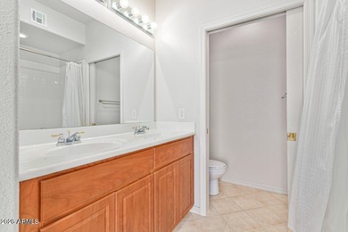 Enter into comfortable living with this delightful townhome in on Superstition Springs Golf Club in Arizona - for sale on GolfHomes.com, golf home, golf lot