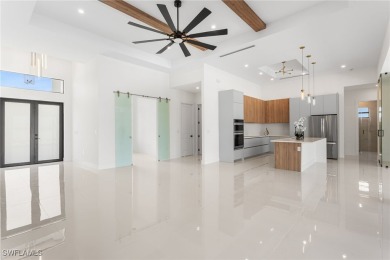Experience REFINED LIVING in this MODERN LUXURY RESIDENCE in on Palmetto-Pine Country Club in Florida - for sale on GolfHomes.com, golf home, golf lot