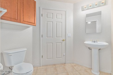 Enter into comfortable living with this delightful townhome in on Superstition Springs Golf Club in Arizona - for sale on GolfHomes.com, golf home, golf lot