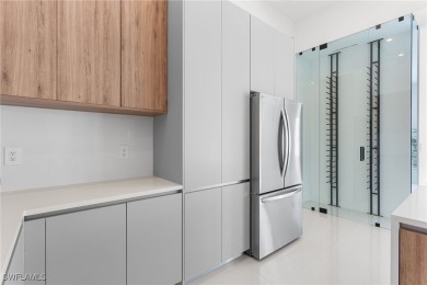 Experience REFINED LIVING in this MODERN LUXURY RESIDENCE in on Palmetto-Pine Country Club in Florida - for sale on GolfHomes.com, golf home, golf lot