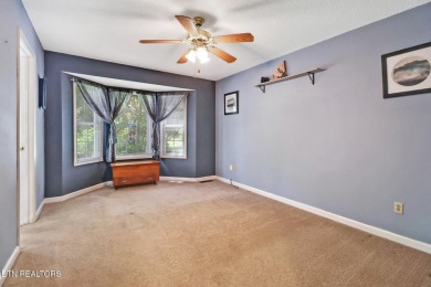 Nestled in a peaceful neighborhood within walking distance to on Druid Hills Golf Club in Tennessee - for sale on GolfHomes.com, golf home, golf lot