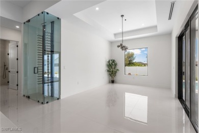 Experience REFINED LIVING in this MODERN LUXURY RESIDENCE in on Palmetto-Pine Country Club in Florida - for sale on GolfHomes.com, golf home, golf lot