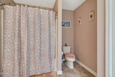 Nestled in a peaceful neighborhood within walking distance to on Druid Hills Golf Club in Tennessee - for sale on GolfHomes.com, golf home, golf lot